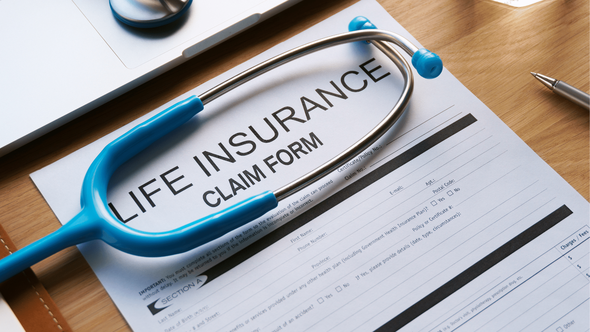 Photo of life insurance policy and stethoscope